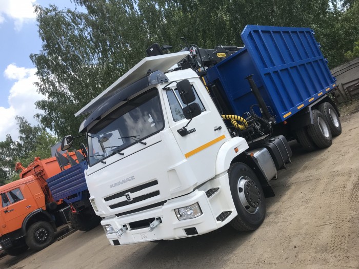 Автомобиль МЕТАЛЛОВОЗ 28м3 КамАЗ 65115  с КМУ Велмаш VM10L74M (за кабиной) (6х4)